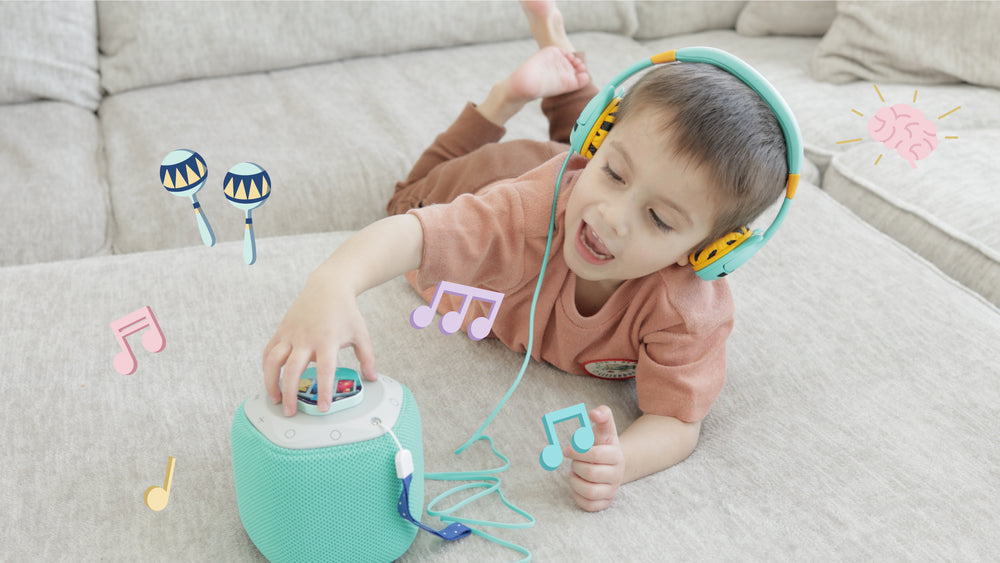 Child listening to a Token on Storypod with headphones